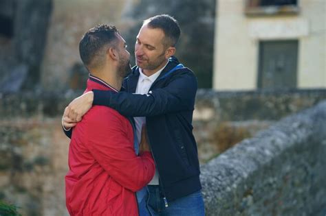 Premium Photo Gay Couple Embracing Outdoors Premium Photo Gay Couple Embracing Outdoors